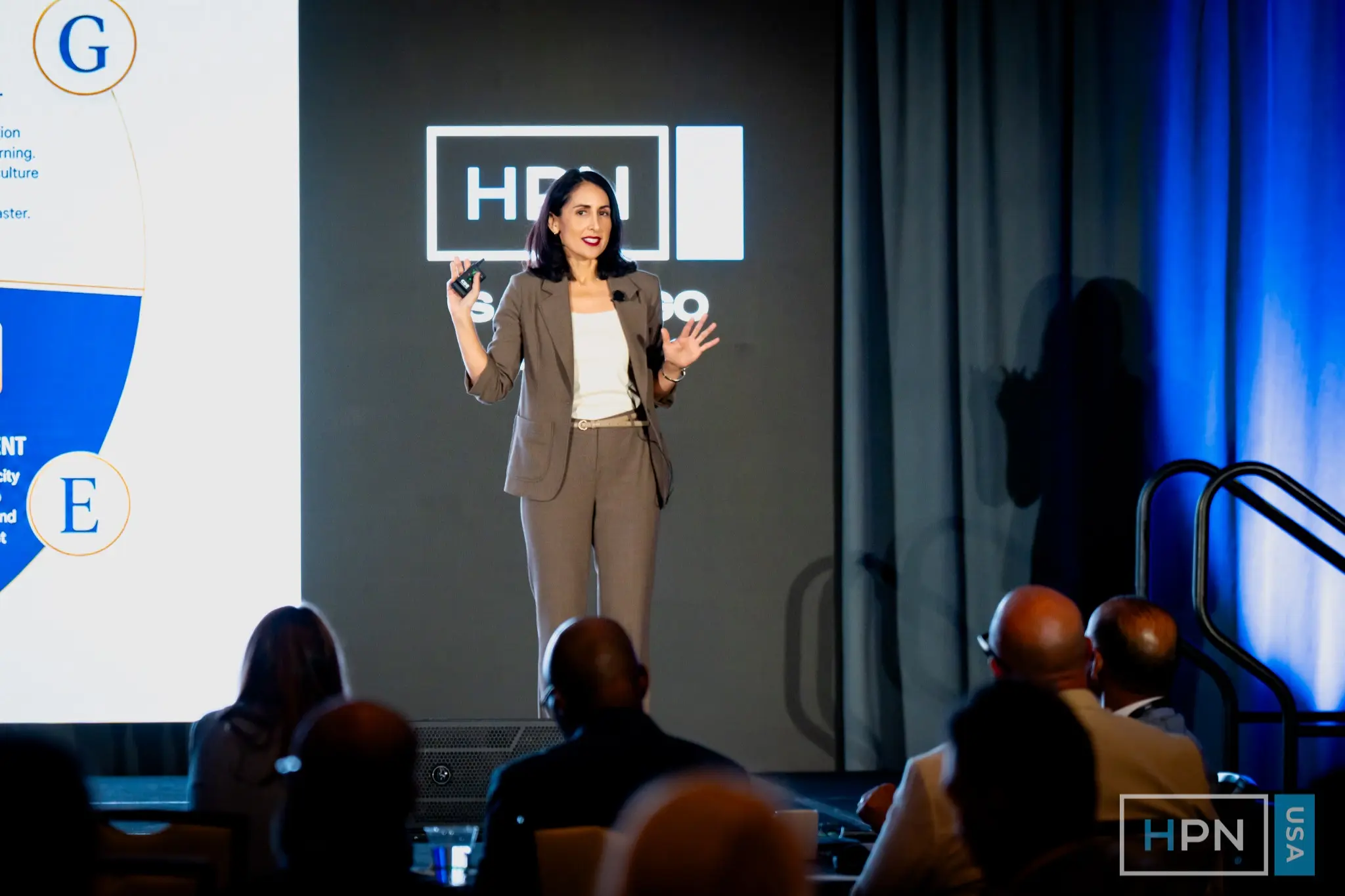 Brenda speaking on stage